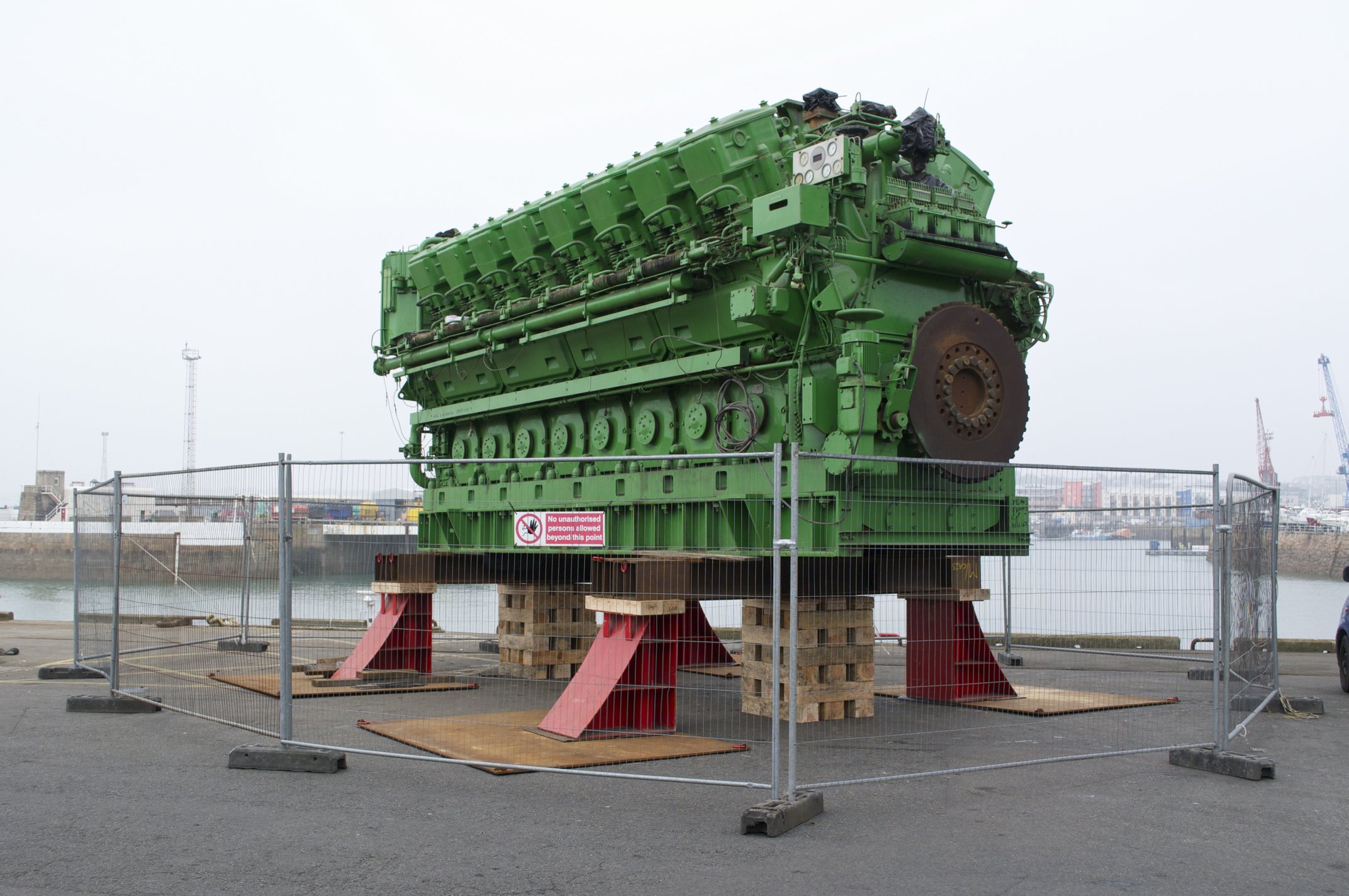 One of the two Sulzer Diesel Generators destined for La Collete sits on the docks in St Helier.
