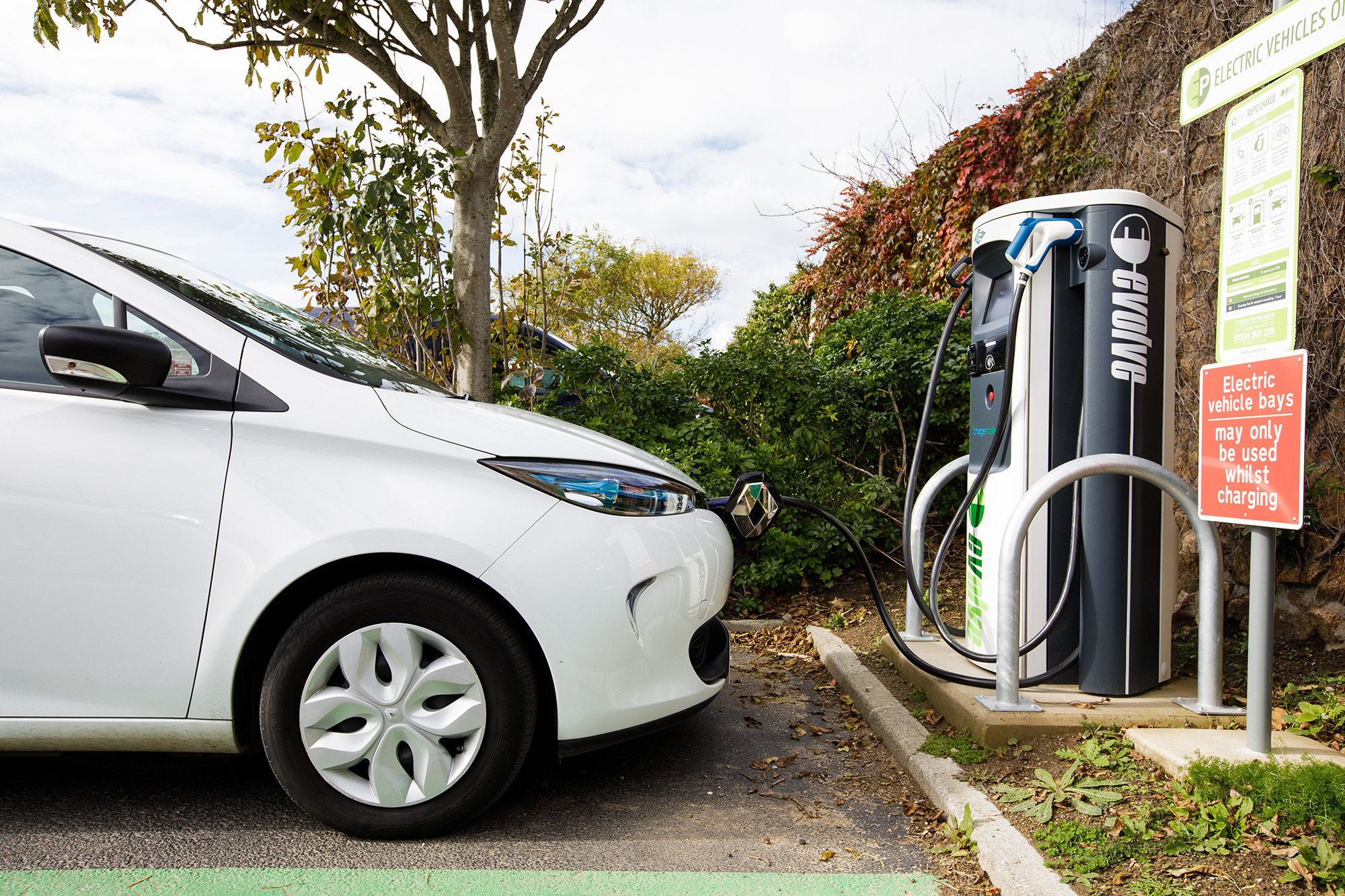 An electric vehicle charges at Red Houses in St Brelades.