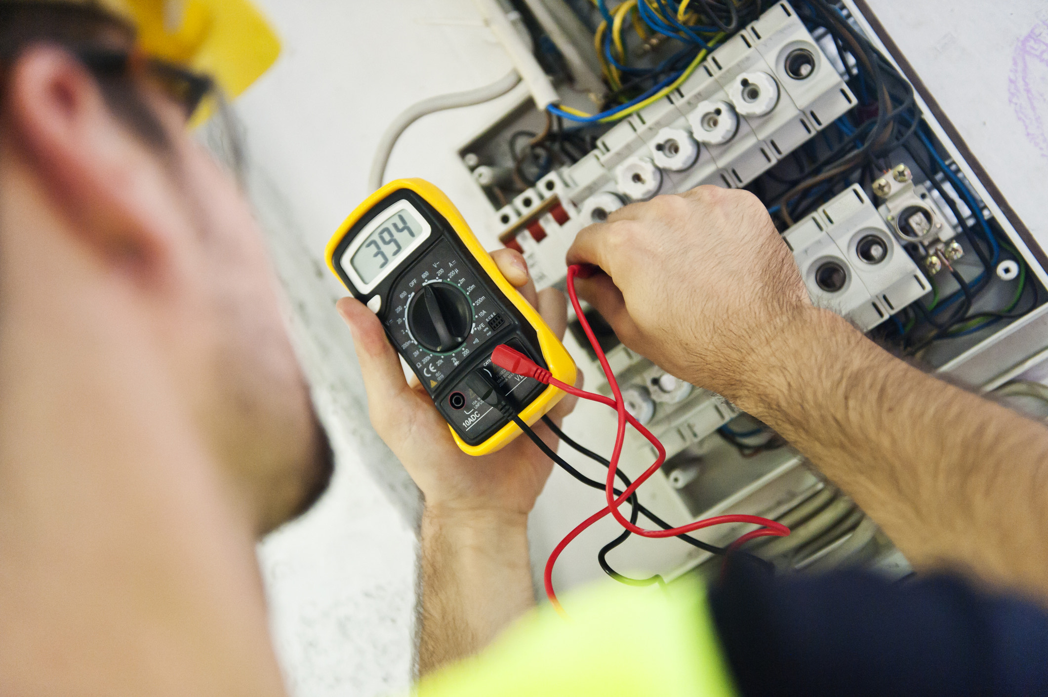 An electrician carries out maintenance.