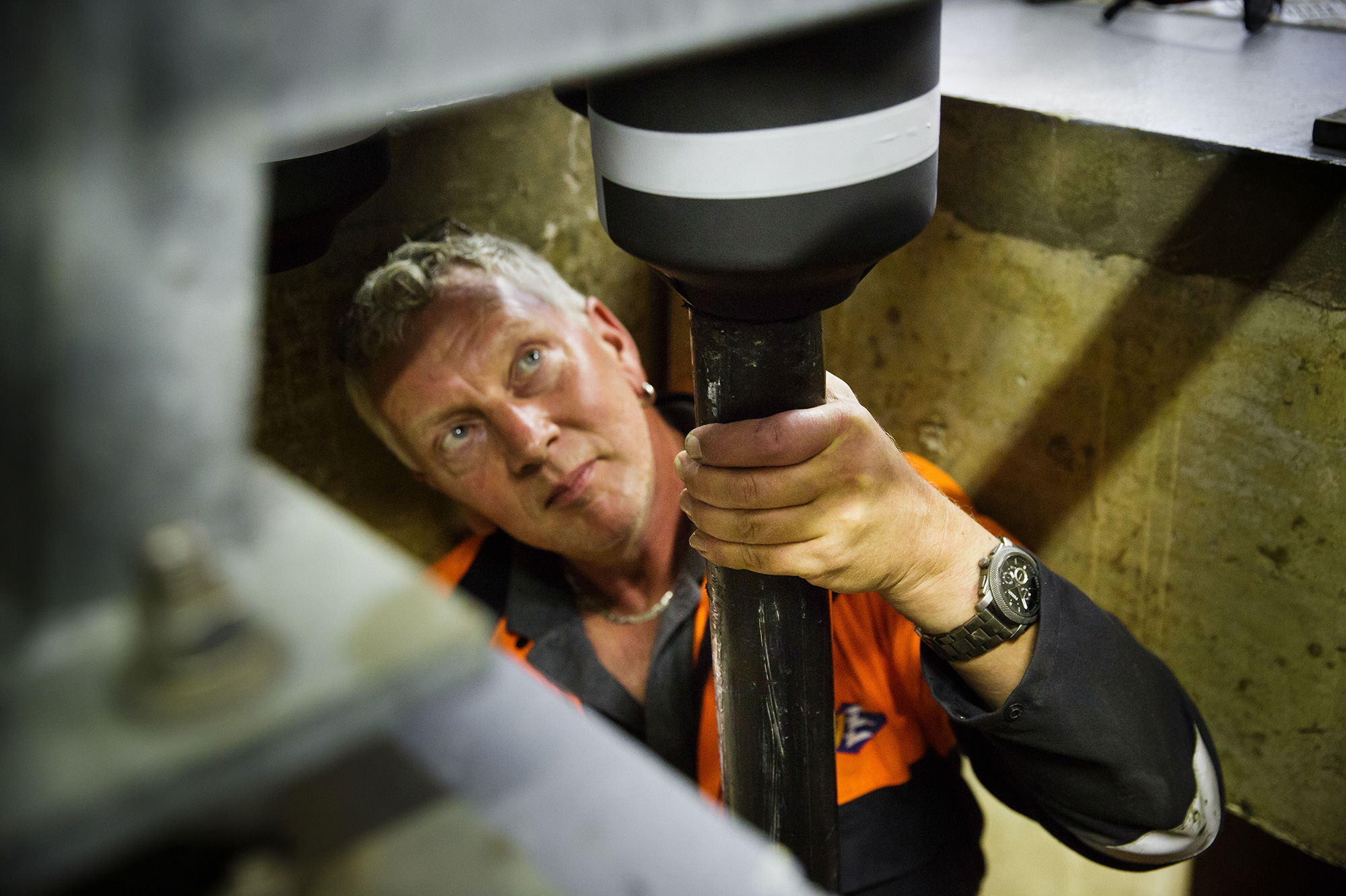 A member of Jersey Electricity's Energy Division helps connect one of the island's subsea cables.