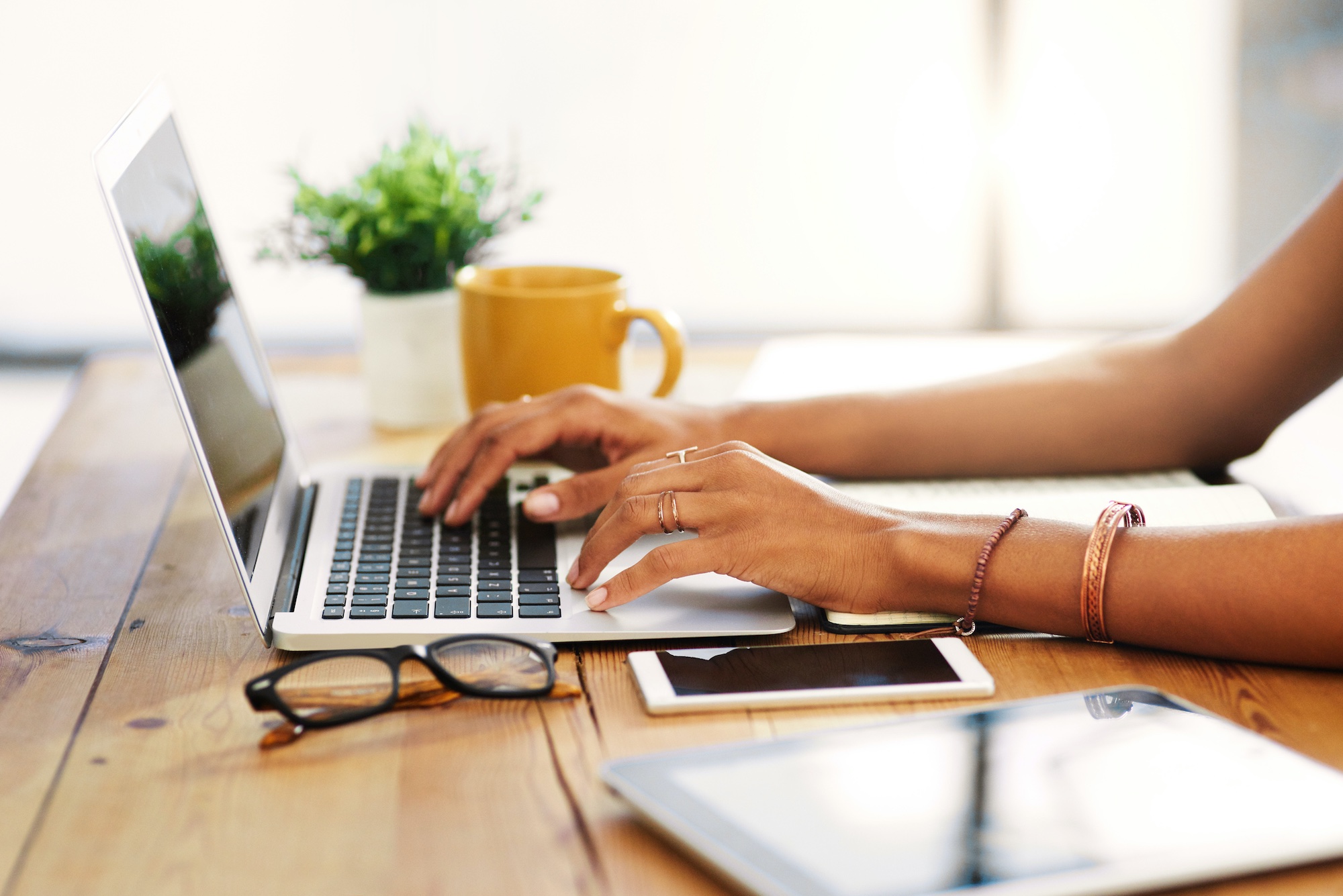 Woman using a laptop at home