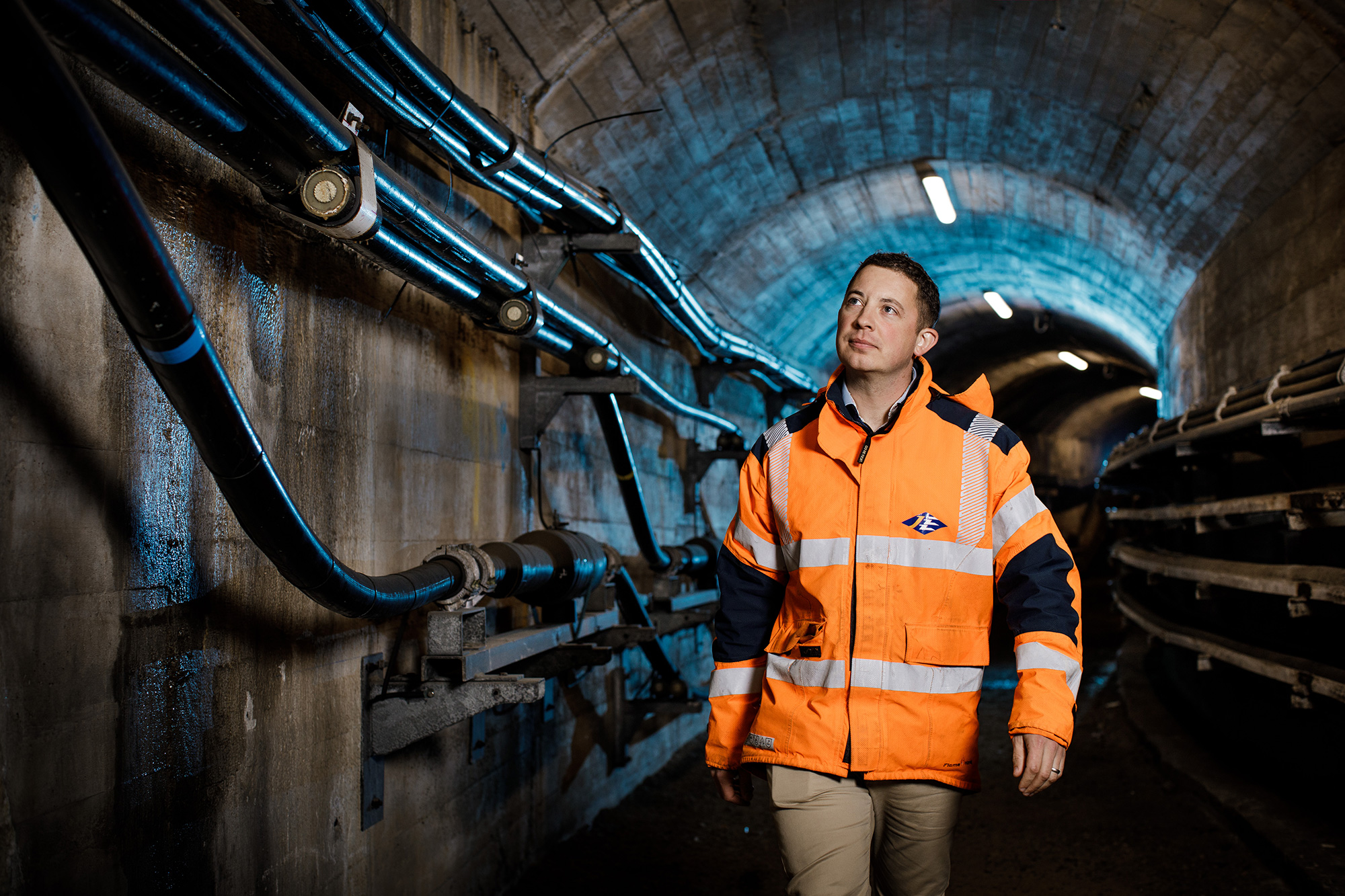 Ashley Mariner, a Jersey Electricity Engineer inspects a series of supply cables.