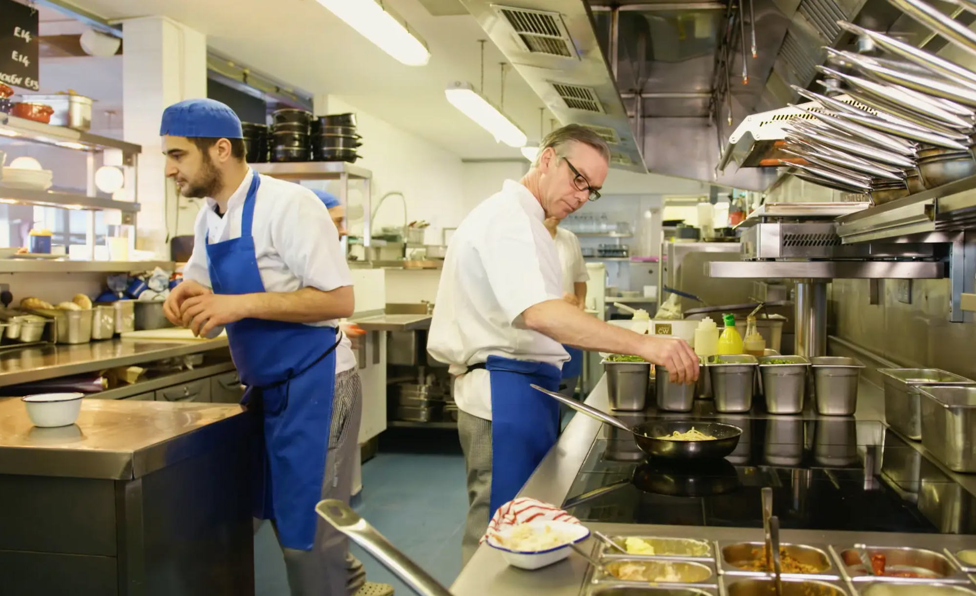 Chefs working in El Tico's kitchen