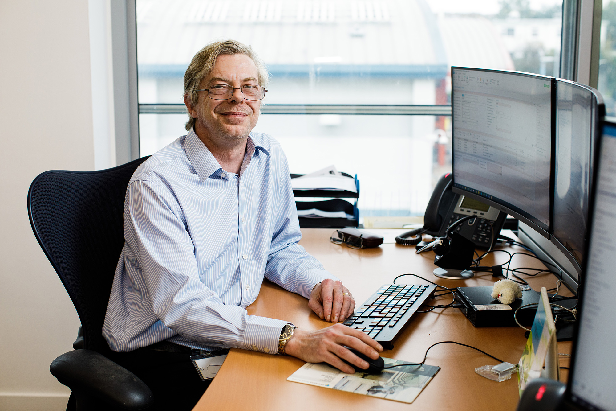 Scott Aldridge is photographed at his desk in the Jersey Electricity Powerhouse offices.