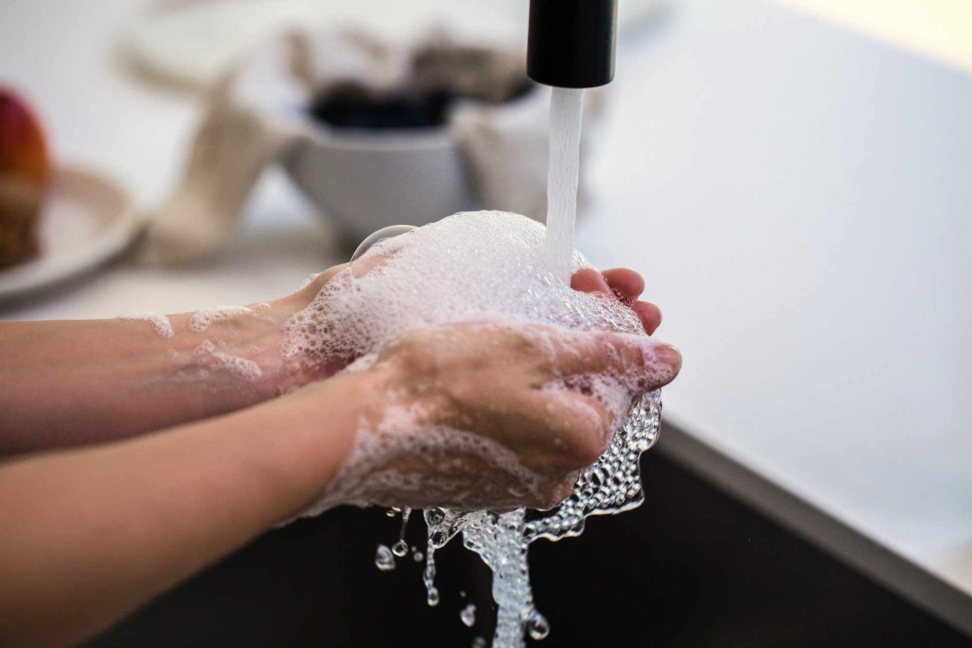 Person washing their hands