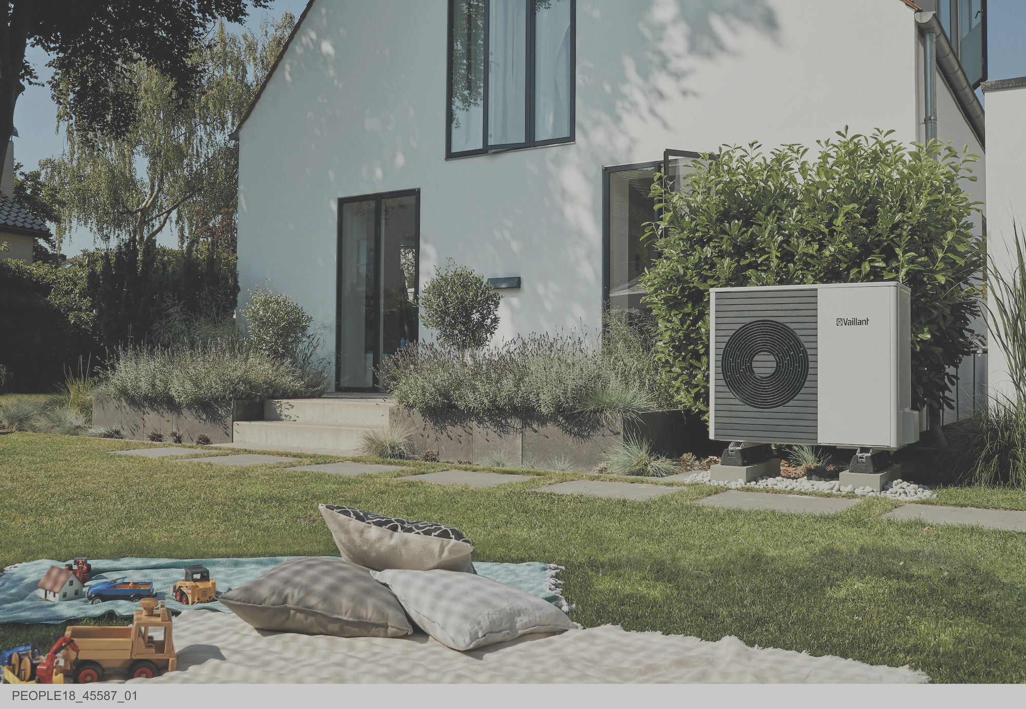 Ground source heat pump outside a modern home