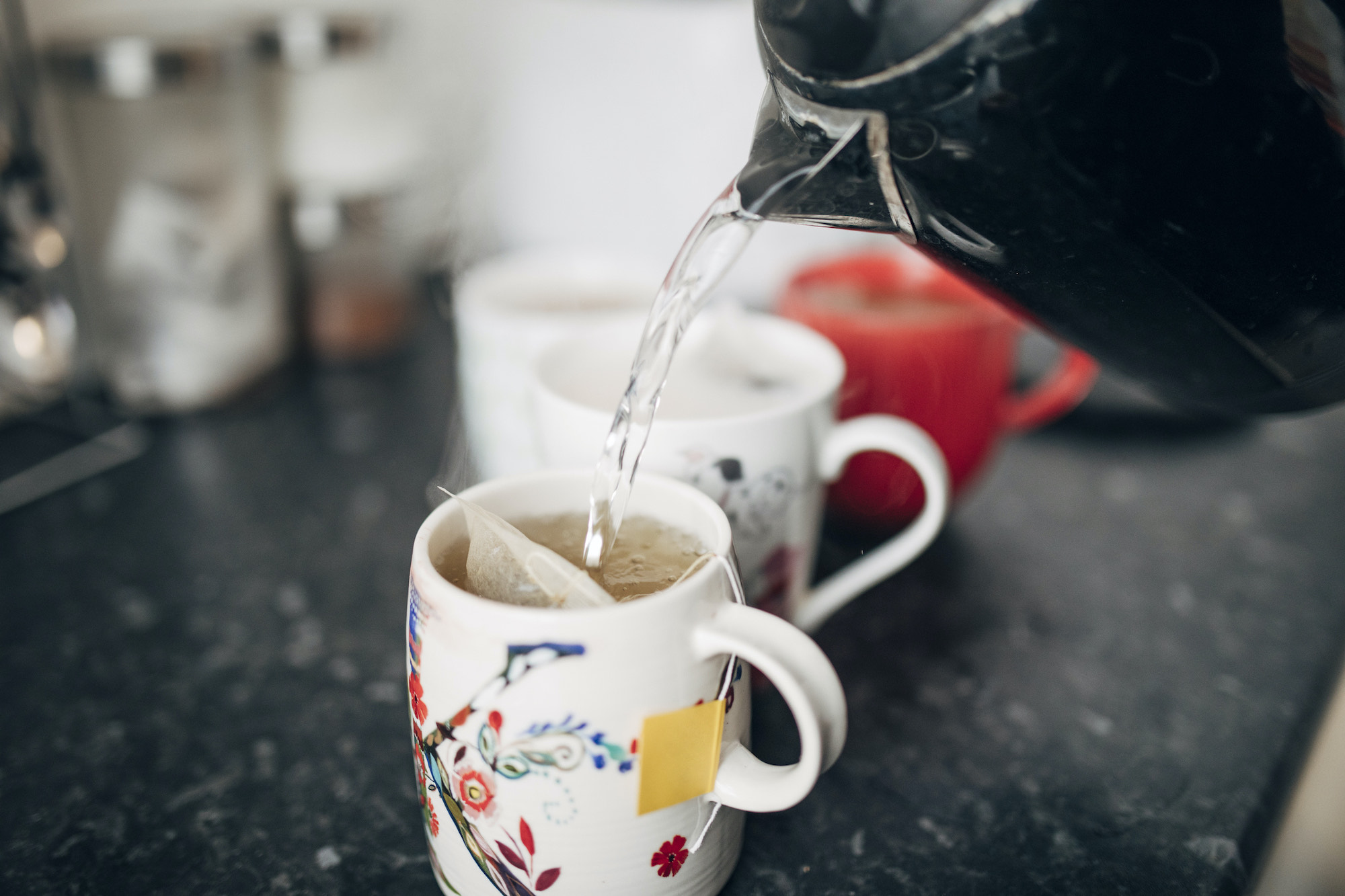 Pouring two cups of tea